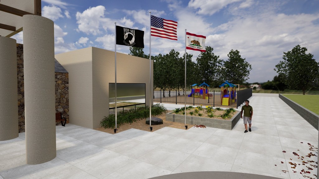 Concept rendering showing the proposed memorial beside the Lakeside Community Center with the United States, POW-MIA, and California flags